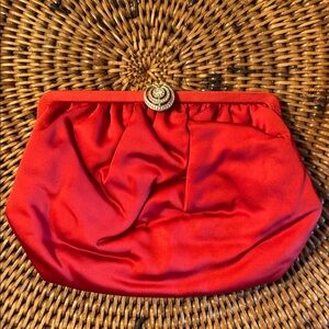 Chic Red Clutch with Decorative Clasp